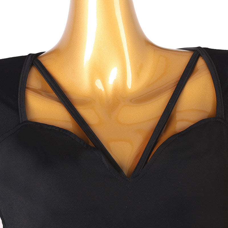 Close view of the crossed straps above the sweetheart neckline