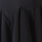 Close view of the fluted hem on the black practice skirt