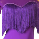 Close view of the purple fringe yoke across the chest