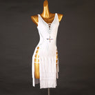 White cutaway hip latin dance dress front view showing the fringe stack