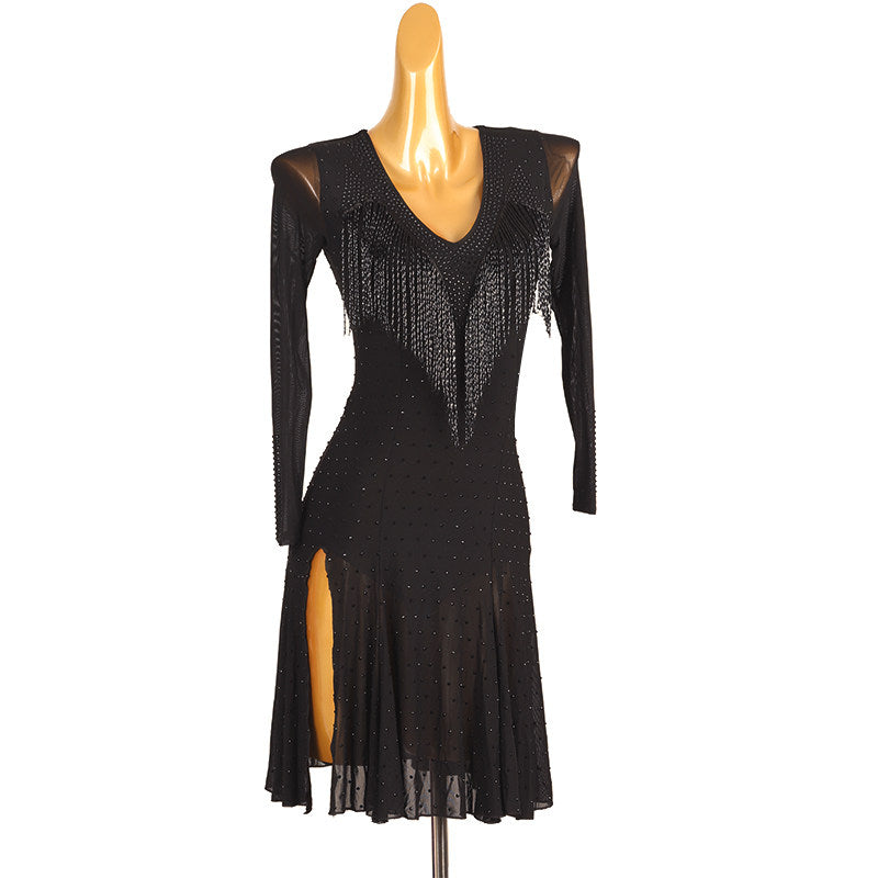 Black hand strung bead latin dance dress angled view with the fluted hem
