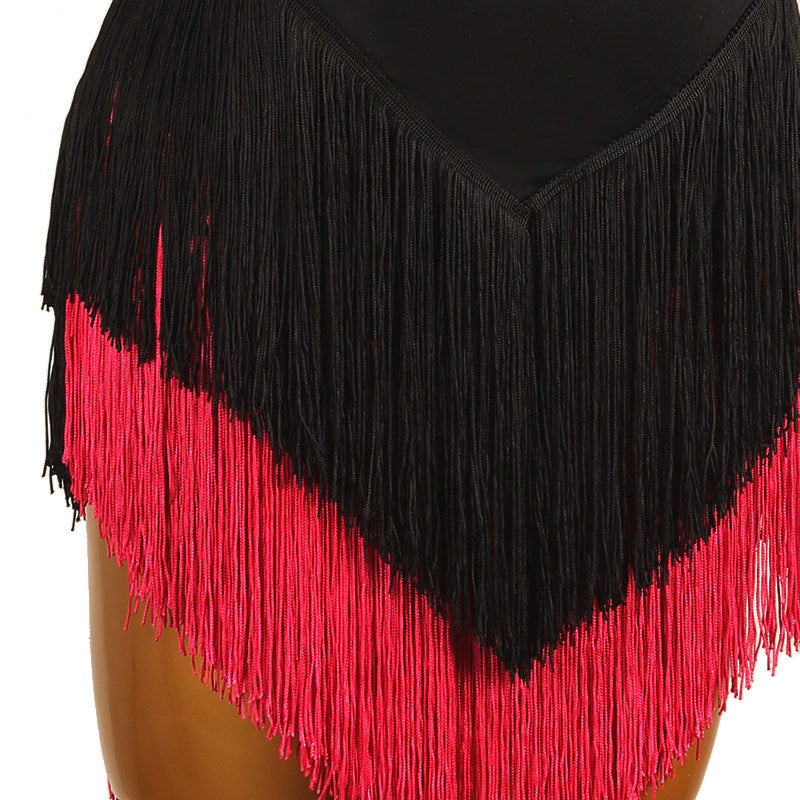 Close view of the black and red fringe meeting at the chevron