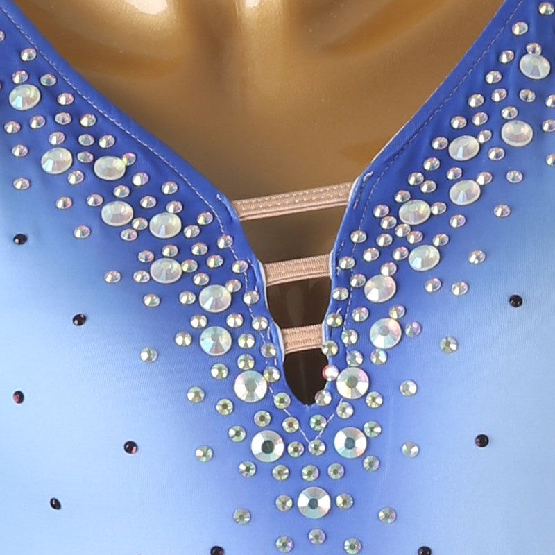 Close view of the stones gathered around the strap ladder neckline