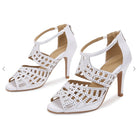 pair of white rhinestone cutout wedding dance shoes for women with peep toe and slim heels