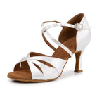 White satin wedding dance shoe with a latin suede sole, open toe crossed bands, rhinestone buckle strap and bridal flared heel